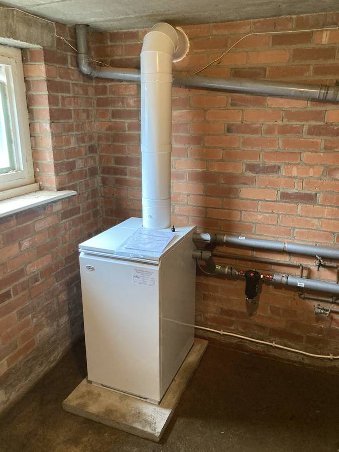 Floor-standing oil boiler — brick outbuilding