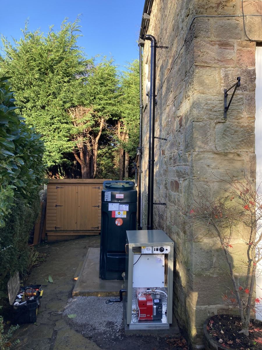 External oil boiler & tank — stone farmhouse